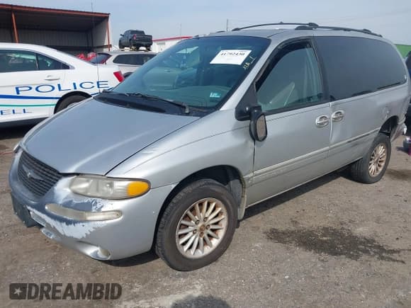 ✅ 1999 Chrysler Town & Country LX • VIN: 1C4GP54L3XB899589 • Lot: 41792430. Listed on IAAI with 248,850 mi. Free auction sales archive from the USA and detailed vehicle history report at DreamBid. Image 2.