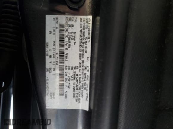 ✅ 2015 Ford Focus Titanium • VIN: 1FADP3J20FL231220 • Lot: 80630245. Listed on Copart with 143,805 mi. Free auction sales archive from the USA and detailed vehicle history report at DreamBid. Image 12.