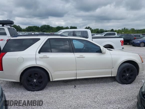 ✅ 2006 Cadillac SRX • VIN: 1GYEE637460169346 • Lot: 43083831. Listed on IAAI with 135,820 mi. Free auction sales archive from the USA and detailed vehicle history report at DreamBid. Image 13.