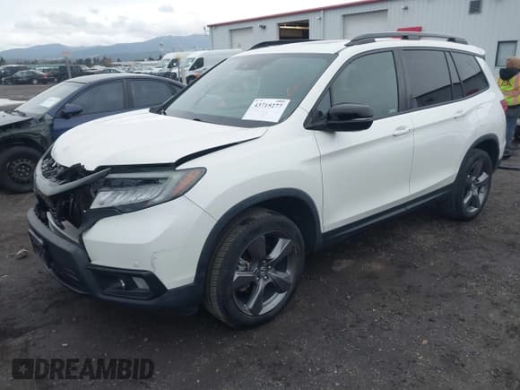 ✅ 2019 Honda Passport Touring • VIN: 5FNYF8H98KB008970 • Lot: 43715277. Listed on IAAI with 76,133 mi. Free auction sales archive from the USA and detailed vehicle history report at DreamBid. Image 2.