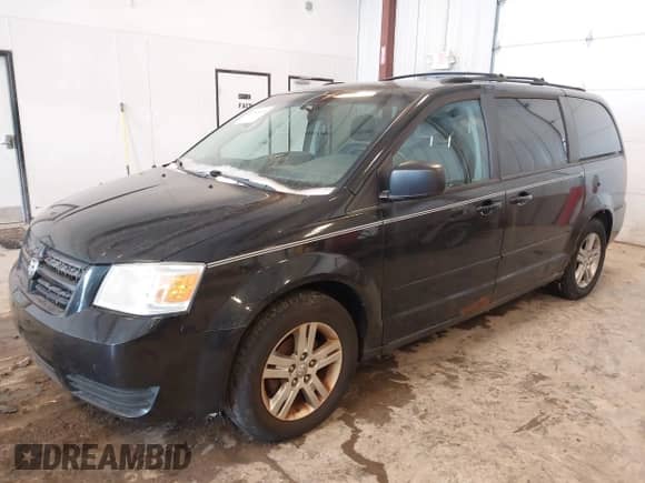 2010 Dodge Grand Caravan SE with VIN 2D4RN4DE2AR481482, listed as a IAAI auction lot 41546024 with 131,035 mi miles and . Bid and sale history available at DreamBid. Image 2.