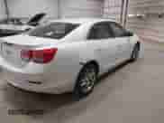 2015 Chevrolet Malibu LT with VIN 1G11C5SL2FF217211, listed as a IAAI auction lot 43456087 with 175,332 mi miles and . Bid and sale history available at DreamBid. Image 4.