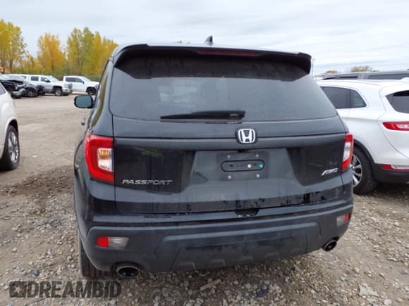 ✅ 2021 Honda Passport EX-L • VIN: 5FNYF8H53MB016748 • Lot: 43451612. Listed on IAAI with 84,196 mi. Free auction sales archive from the USA and detailed vehicle history report at DreamBid. Image 16.