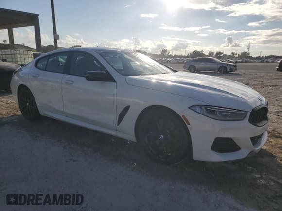 ✅ 2023 BMW 8 Series M850i • VIN: WBAGV8C00PCL59929 • Lot: 87414525. Listed on Copart with 14,080 mi. Free auction sales archive from the USA and detailed vehicle history report at DreamBid. Image 4.