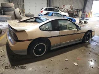 ✅ 1986 Pontiac Fiero • VIN: 1G2PG9791GP270010 • Lot: 85058834. Wystawiony na Copart z przebiegiem 193 802 mil. Bezpłatny archiwum sprzedaży aukcyjnych z USA i szczegółowy raport historii pojazdu na DreamBid. Zdjęcie 3.