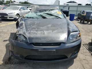 2006 Hyundai Tiburon GT с VIN KMHHN65F76U203646, выставлен на аукционе Copart как лот 65899555 с пробегом Не указан миль и Списание • Salvage title. История ставок и продаж доступна на DreamBid. Изображение 5.