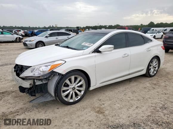 ✅ 2013 Hyundai Azera • VIN: KMHFH4JG2DA241723 • Лот: 63811385. Опубликован ранее на Copart с пробегом 164 418 миль. Бесплатный доступ к архиву аукционных продаж из США и подробный отчёт об истории автомобиля на DreamBid. Изображение 1.