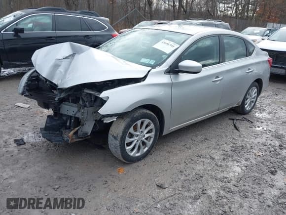 ✅ 2019 Nissan Sentra SV • VIN: 3N1AB7AP0KY370122 • Lot: 43696341. Listed on IAAI with 104,689 mi. Free auction sales archive from the USA and detailed vehicle history report at DreamBid. Image 17.