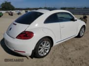 ✅ 2013 Volkswagen Beetle 2.0L TDI • VIN: 3VWJL7AT6DM663781 • Lot: 66522975. Wystawiony na Copart z przebiegiem 120 229 mil. Bezpłatny archiwum sprzedaży aukcyjnych z USA i szczegółowy raport historii pojazdu na DreamBid. Zdjęcie 3.
