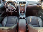 ✅ 2016 Ford Fusion Titanium • VIN: 3FA6P0K98GR118105 • Lot: 94731915. Listed on Copart with 125,812 mi. Free auction sales archive from the USA and detailed vehicle history report at DreamBid. Image 8.