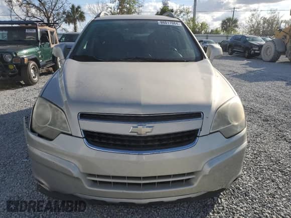 2014 Chevrolet Captiva Sport LT с VIN 3GNAL3EK0ES586570, выставлен на аукционе Copart как лот 86017084 с пробегом 152 912 миль миль и Списание • Salvage title. История ставок и продаж доступна на DreamBid. Изображение 5.