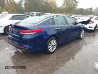 ✅ 2018 Kia Optima LX • VIN: 5XXGT4L31JG258904 • Lot: 43575584. Listed on IAAI with 96,778 mi. Free auction sales archive from the USA and detailed vehicle history report at DreamBid. Image 4.