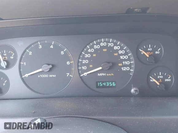 ✅ 1999 Jeep Grand Cherokee Laredo • VIN: 1J4GW58S1XC520727 • Lot: 43730318. Wystawiony na IAAI z przebiegiem 154 356 mil. Bezpłatny archiwum sprzedaży aukcyjnych z USA i szczegółowy raport historii pojazdu na DreamBid. Zdjęcie 15.