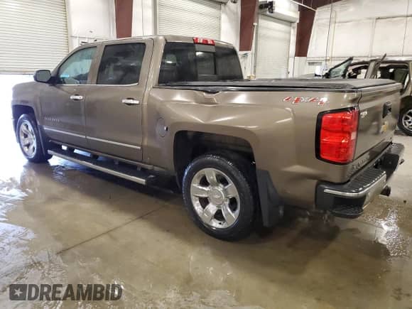 2015 Chevrolet Silverado 1500 LTZ с VIN 3GCUKSEJ5FG338703, выставлен на аукционе Copart как лот 81143165 с пробегом 125 749 миль миль и Списание • Salvage title. История ставок и продаж доступна на DreamBid. Изображение 2.