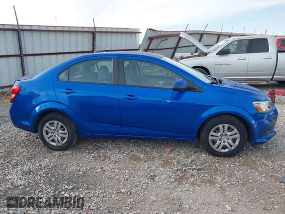 ✅ 2017 Chevrolet Sonic LS • VIN: 1G1JB5SH5H4151055 • Lot: 43635264. Listed on IAAI with 91,397 mi. Free auction sales archive from the USA and detailed vehicle history report at DreamBid. Image 13.