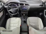 ✅ 2019 Volkswagen Tiguan SEL Premium • VIN: 3VV4B7AX6KM155721 • Лот: 91967615. Опубликован ранее на Copart с пробегом 98 630 миль. Бесплатный доступ к архиву аукционных продаж из США и подробный отчёт об истории автомобиля на DreamBid. Изображение 8.