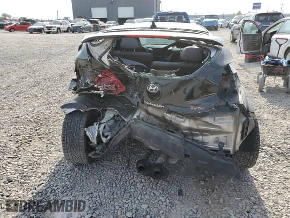 2013 Hyundai Veloster Turbo z VIN KMHTC6AE5DU147457, wystawiony jako Copart lot #65047405 z przebiegiem 108 688 mil mil oraz Szkoda całkowita • Salvage title. Historia ofert i sprzedaży dostępna na DreamBid. Obrazek 6.