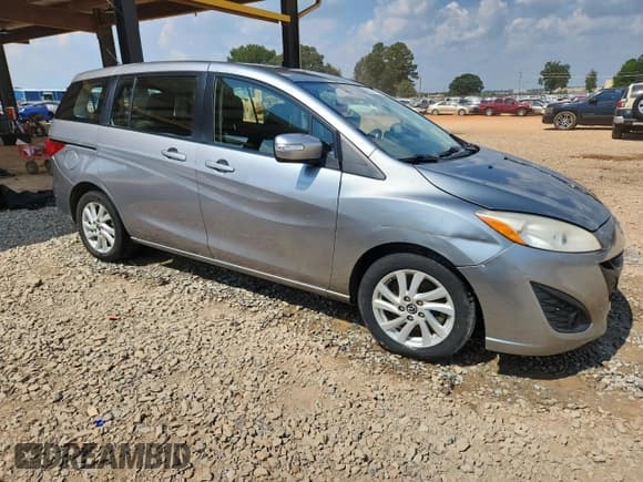 ✅ 2015 Mazda 5 Sport • VIN: JM1CW2BLXF0189652 • Lot: 81431415. Listed on Copart with 198,321 mi. Free auction sales archive from the USA and detailed vehicle history report at DreamBid. Image 4.