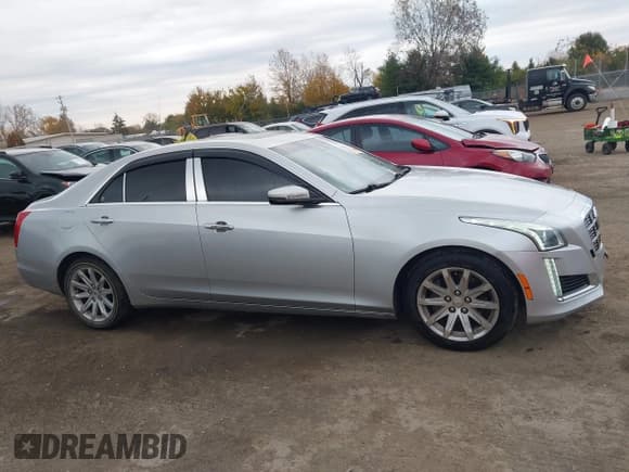 ✅ 2014 Cadillac CTS Luxury AWD • VIN: 1G6AX5S38E0147228 • Lot: 43601729. Listed on IAAI with 116,728 mi. Free auction sales archive from the USA and detailed vehicle history report at DreamBid. Image 13.