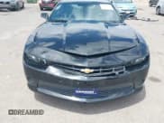 ✅ 2015 Chevrolet Camaro LS • VIN: 2G1FB1E34F9113308 • Lot: 42795652. Listed on IAAI with 104,728 mi. Free auction sales archive from the USA and detailed vehicle history report at DreamBid. Image 6.