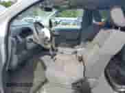 2011 Nissan Frontier SV z VIN 1N6AD0CU6BC401168, wystawiony jako Copart lot #58745435 z przebiegiem 197 918 mil mil oraz Szkoda całkowita • Salvage title. Historia ofert i sprzedaży dostępna na DreamBid. Obrazek 7.