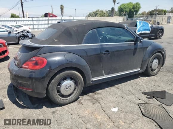 ✅ 2014 Volkswagen Beetle 1.8T • VIN: 3VW507AT4EM819649 • Lot: 67871065. Listed on Copart with 145,262 mi. Free auction sales archive from the USA and detailed vehicle history report at DreamBid. Image 3.