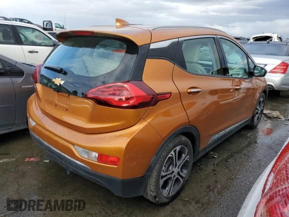 2017 Chevrolet Bolt EV Premier z VIN 1G1FX6S00H4157465, wystawiony jako Copart lot #40251184 z przebiegiem 48 736 mil mil oraz . Historia ofert i sprzedaży dostępna na DreamBid. Obrazek 3.