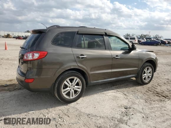 ✅ 2012 Hyundai Santa Fe Limited • VIN: 5XYZK3AB6CG152575 • Lot: 87521685. Listed on Copart with 92,260 mi. Free auction sales archive from the USA and detailed vehicle history report at DreamBid. Image 3.