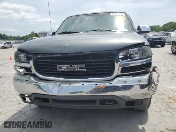 ✅ 2000 GMC Sierra 1500 SLE • VIN: 1GTEK14TXYZ181805 • Лот: 57353695. Опубликован ранее на Copart с пробегом 306 163 миль. Бесплатный доступ к архиву аукционных продаж из США и подробный отчёт об истории автомобиля на DreamBid. Изображение 5.