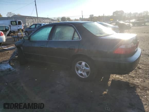 1999 Honda Accord EX with VIN 1HGCG1657XA026344, listed as a Copart auction lot 82601025 with Not provided miles and Salvage title. Bid and sale history available at DreamBid. Image 2.