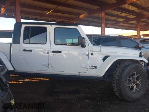 ✅ 2021 Jeep Gladiator Sport S • VIN: 1C6JJTAG8ML557863 • Lot: 43447555. Listed on IAAI with 24,365 mi. Free auction sales archive from the USA and detailed vehicle history report at DreamBid. Image 14.