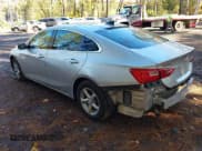 ✅ 2017 Chevrolet Malibu LS • VIN: 1G1ZB5STXHF194883 • Lot: 43582481. Listed on IAAI with 107,181 mi. Free auction sales archive from the USA and detailed vehicle history report at DreamBid. Image 3.