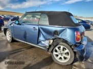 ✅ 2010 MINI Convertible S • VIN: WMWMS3C50ATZ85210 • Lot: 91312235. Wystawiony na Copart z przebiegiem 59 400 mil. Bezpłatny archiwum sprzedaży aukcyjnych z USA i szczegółowy raport historii pojazdu na DreamBid. Zdjęcie 2.