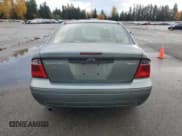 ✅ 2006 Ford Focus S • VIN: 1FAFP34N56W242498 • Lot: 91859985. Wystawiony na Copart z przebiegiem 70 540 mil. Bezpłatny archiwum sprzedaży aukcyjnych z USA i szczegółowy raport historii pojazdu na DreamBid. Zdjęcie 6.