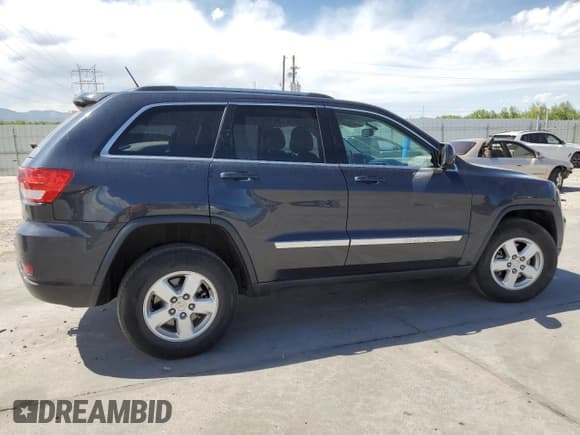 ✅ 2013 Jeep Grand Cherokee Laredo • VIN: 1C4RJFAG7DC645932 • Lot: 57969715. Listed on Copart with 165,717 mi. Free auction sales archive from the USA and detailed vehicle history report at DreamBid. Image 3.