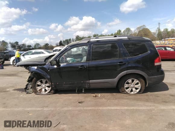 ✅ 2009 Kia Borrego EX • VIN: KNDJJ741795015401 • Lot: 41965858. Listed on IAAI with 171,323 mi. Free auction sales archive from the USA and detailed vehicle history report at DreamBid. Image 15.