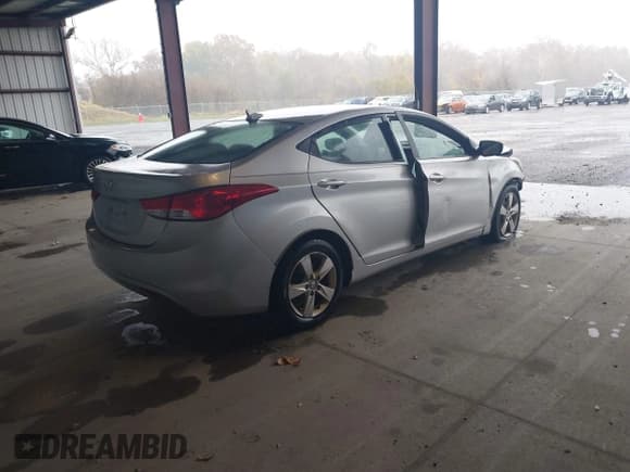 ✅ 2013 Hyundai Elantra GLS • VIN: 5NPDH4AE2DH435283 • Lot: 43569074. Listed on IAAI with 100,839 mi. Free auction sales archive from the USA and detailed vehicle history report at DreamBid. Image 4.
