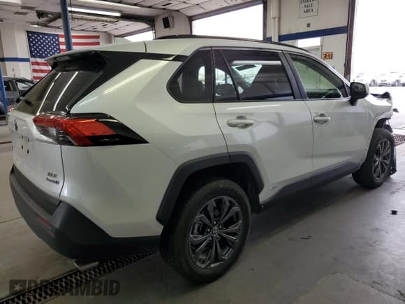 ✅ 2023 Toyota RAV4 Hybrid XLE Premium • VIN: JTMB6RFV4PD542820 • Лот: 84806085. Опубликован ранее на Copart с пробегом 31 306 миль. Бесплатный доступ к архиву аукционных продаж из США и подробный отчёт об истории автомобиля на DreamBid. Изображение 3.