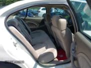 ✅ 2004 Pontiac Bonneville SE • VIN: 1G2HX52K14U176018 • Lot: 42691668. Wystawiony na IAAI z przebiegiem 185 274 mil. Bezpłatny archiwum sprzedaży aukcyjnych z USA i szczegółowy raport historii pojazdu na DreamBid. Zdjęcie 8.