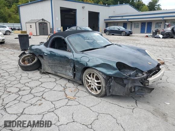 ✅ 2003 Porsche Boxster • VIN: WP0CA29873U621604 • Lot: 69791765. Listed on Copart with Not provided. Free auction sales archive from the USA and detailed vehicle history report at DreamBid. Image 4.