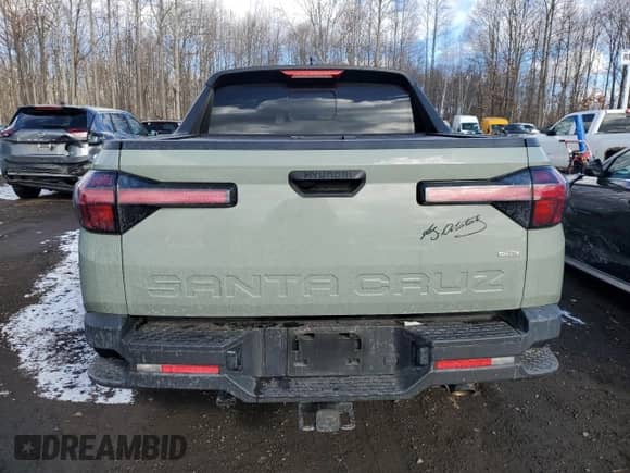 2022 Hyundai Santa Cruz SEL с VIN 5NTJCDAE5NH024321, выставлен на аукционе Copart как лот 42774515 с пробегом 41 177 миль миль и Списание • Salvage title. История ставок и продаж доступна на DreamBid. Изображение 6.