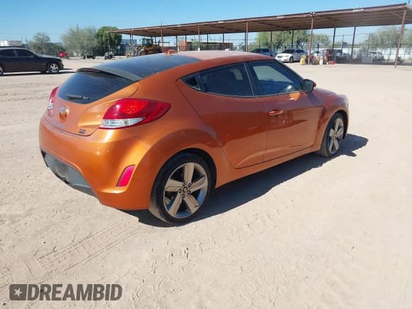 ✅ 2015 Hyundai Veloster • VIN: KMHTC6ADXFU219196 • Lot: 43606291. Listed on IAAI with 130,868 mi. Free auction sales archive from the USA and detailed vehicle history report at DreamBid. Image 4.