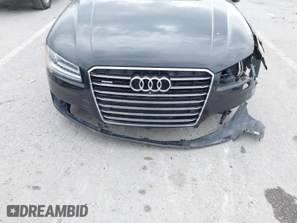 ✅ 2015 Audi A8 4.0T • VIN: WAU32AFD9FN009649 • Lot: 42367874. Wystawiony na IAAI z przebiegiem 138 462 mil. Bezpłatny archiwum sprzedaży aukcyjnych z USA i szczegółowy raport historii pojazdu na DreamBid. Zdjęcie 17.