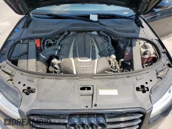 ✅ 2015 Audi A8 4.0T • VIN: WAU32AFD7FN023050 • Lot: 69812845. Wystawiony na Copart z przebiegiem 146 615 mil. Bezpłatny archiwum sprzedaży aukcyjnych z USA i szczegółowy raport historii pojazdu na DreamBid. Zdjęcie 11.