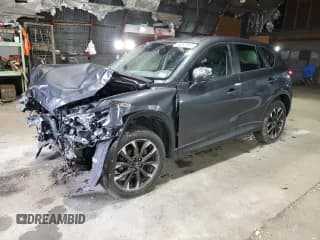 ✅ 2016 Mazda CX-5 Grand Touring • VIN: JM3KE4DY2G0776603 • Lot: 90667005. Wystawiony na Copart z przebiegiem 103 697 mil. Bezpłatny archiwum sprzedaży aukcyjnych z USA i szczegółowy raport historii pojazdu na DreamBid. Zdjęcie 1.