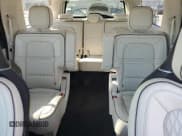 ✅ 2021 Lincoln Navigator Black Label • VIN: 5LMJJ3TT3MEL17149 • Лот: 56899515. Опубликован ранее на Copart с пробегом 50 272 миль. Бесплатный доступ к архиву аукционных продаж из США и подробный отчёт об истории автомобиля на DreamBid. Изображение 10.