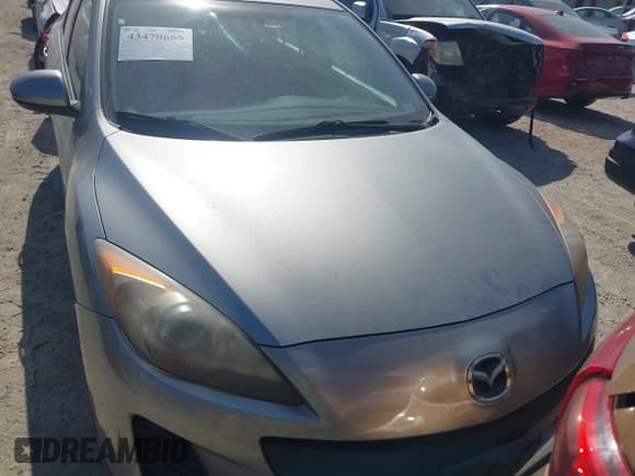 ✅ 2013 Mazda 3 i Touring • VIN: JM1BL1VP0D1772509 • Lot: 43470665. Listed on IAAI with 241,233 mi. Free auction sales archive from the USA and detailed vehicle history report at DreamBid. Image 12.