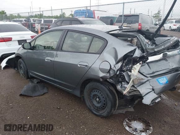✅ 2014 Honda Insight LX • VIN: JHMZE2H54ES000081 • Lot: 42622054. Listed on IAAI with 30,097 mi. Free auction sales archive from the USA and detailed vehicle history report at DreamBid. Image 3.