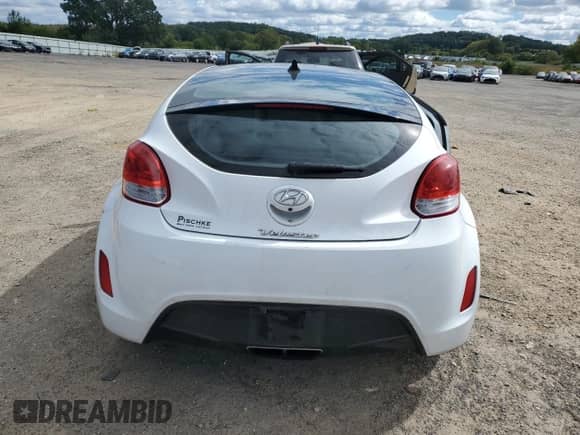 2017 Hyundai Veloster z VIN KMHTC6AD9HU316618, wystawiony jako Copart lot #70060254 z przebiegiem 76 823 mil mil oraz Czysty tytuł • Clean title. Historia ofert i sprzedaży dostępna na DreamBid. Obrazek 6.