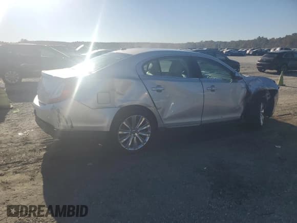 ✅ 2014 Lincoln MKS EcoBoost • VIN: 1LNHL9FT3EG600411 • Lot: 86684605. Listed on Copart with 76,702 mi. Free auction sales archive from the USA and detailed vehicle history report at DreamBid. Image 3.